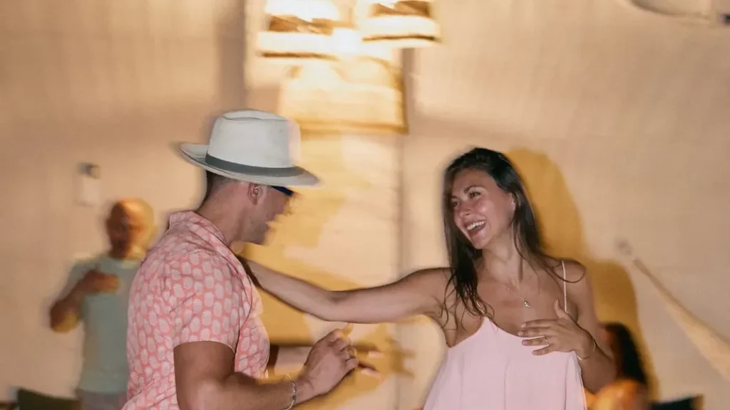Coaches Kosta and Ilinca dancing together in the Beach Ballroom studio
