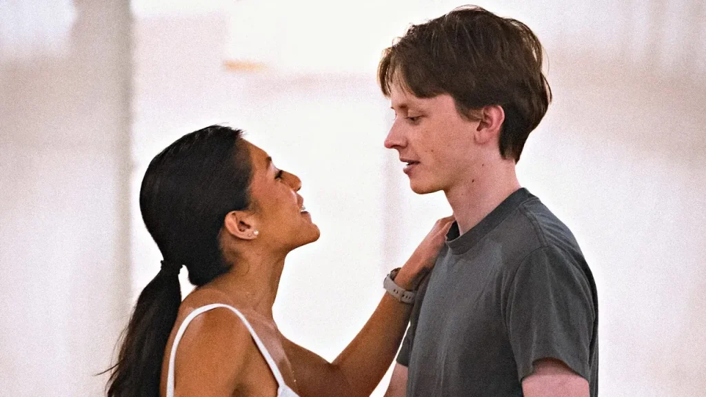 A couple in hold, eyes on each other, during a private lesson at Beach Ballroom
